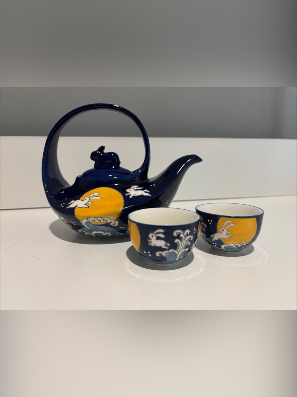 Decorative Navy Blue Teapot and Cup Set with Rabbit Motif